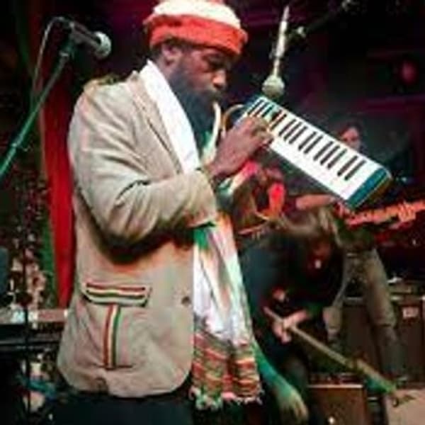 Akin playing Melodica .jpeg